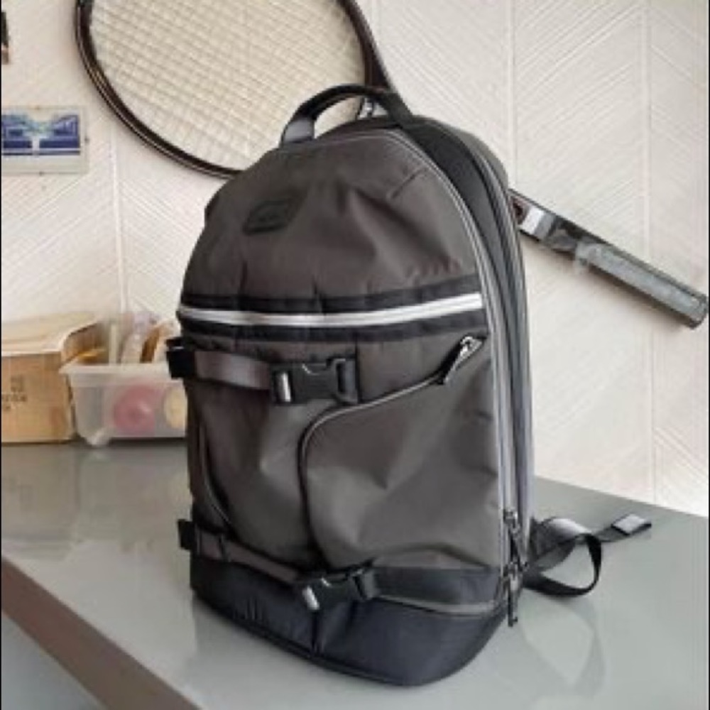 Gray TUMI  backpack. Never used.
